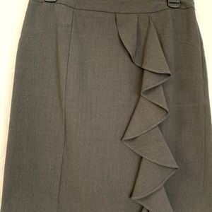 Adrienne Vittadini gray skirt. Above the knee. Ruffle detail on front.
